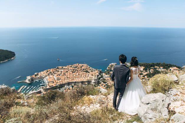 newly married couple overlooking Dubrovnik