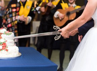 28 exciting wedding traditions in Europe to make your wedding fun and unique Spanish Bride Cuts cake with a sword