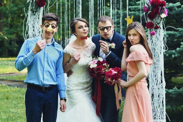 How to Make the Most of Your Wedding Photographer: A Complete Guide 3 Bride and groom laughing together on their wedding day