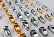 Gold and silver-coloured wedding bands displayed in different widths